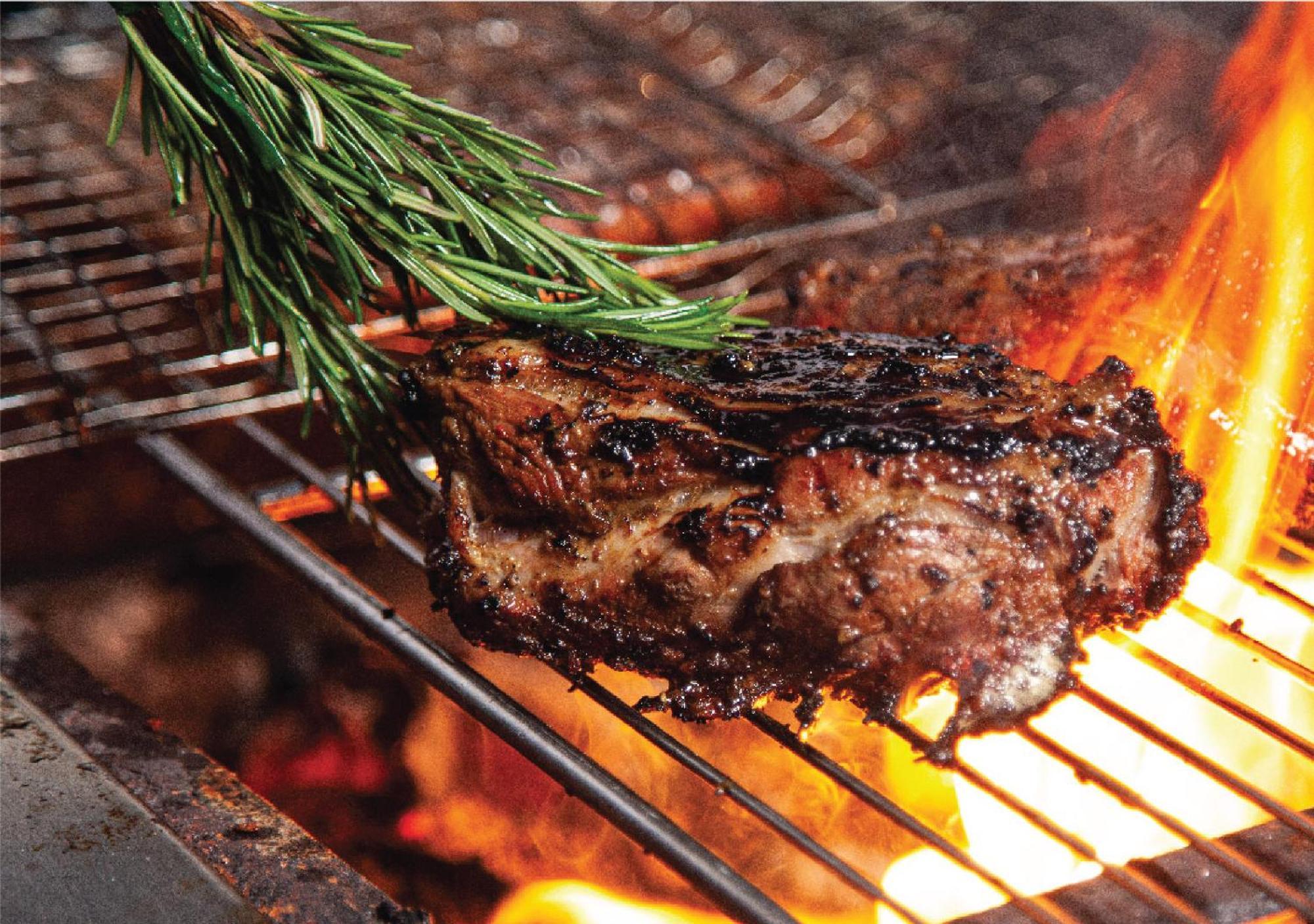 Jumeirah Messilah Beach Kuwait Kuwait City Exterior foto A steak being grilled